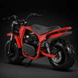 Red motorcycle with black seat on a dark background - NRCD